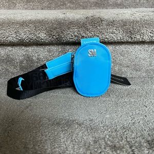 Steve Madden sanitizer pouch with strap